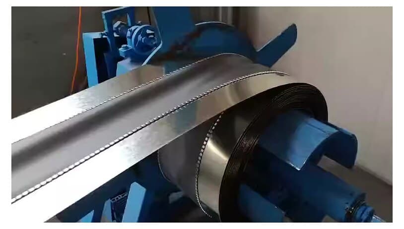 Flexible duct connector showing fabric section bonded between galvanized metal edges.