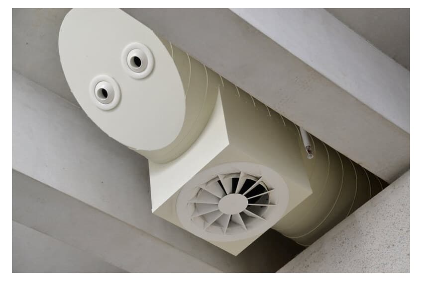 Galvanized square plenum box with circular spigot inlet.